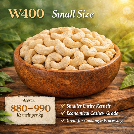 Wooden bowl filled with cashews with text about W400 small size cashews on a natural background.